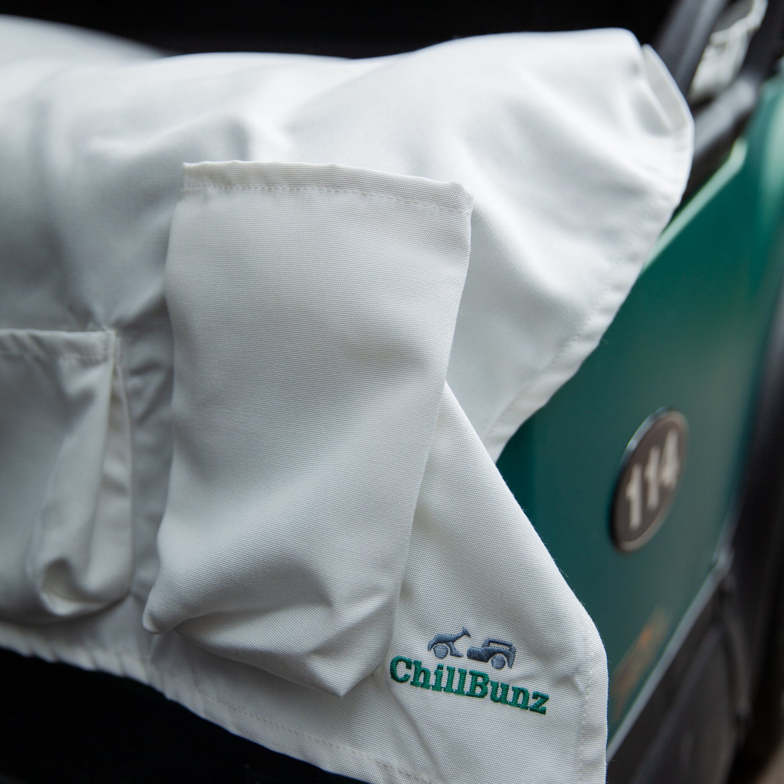 ChillBunz seat cover in Sand-Tan on a golf cart bench seat