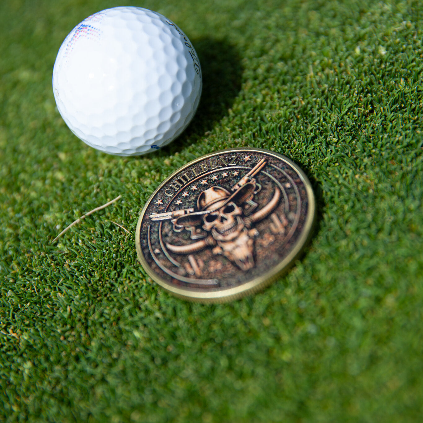 Outlaw Chill ball marker, metal horned skull design