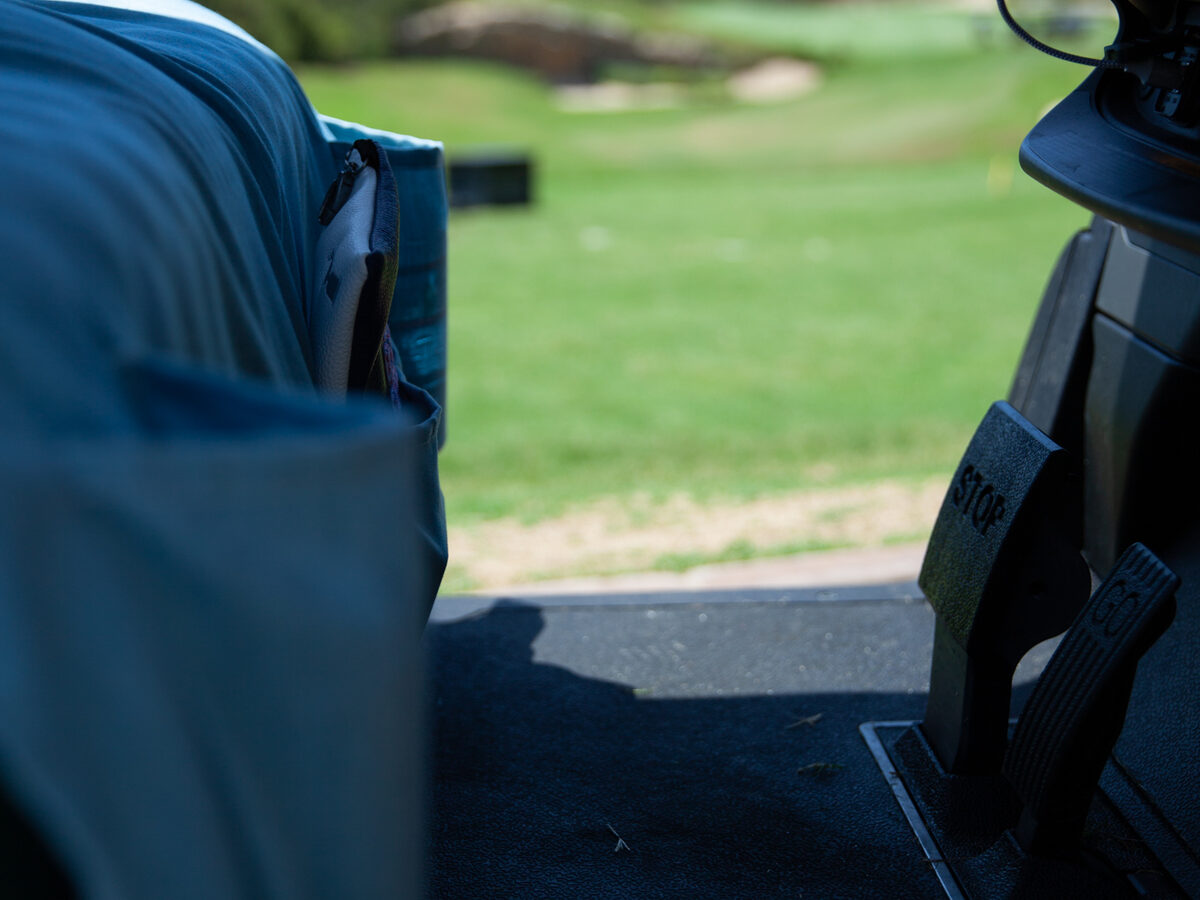 The ChillBunz bench cover on a golf cart out on the course